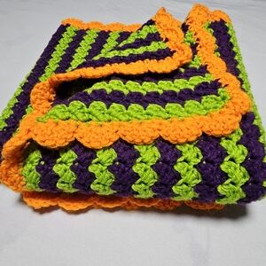 *New* Crochet afghan orange / purple w/ orange edge baby throw  app. 45" by 35"